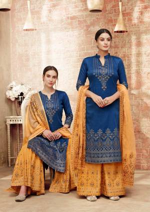 Celebrate This Festive Season With Ease And Comfort Wearing This Designer Straight Suit In Blue Colored Top Paired With Contrasting Musturd Yellow Colored bottom And Dupatta.It Is Light In Weight And Easy To Carry All Day Long. 