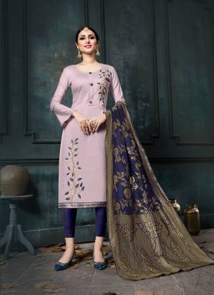 Look Pretty Wearing This Designer Suit In New LiLac Colored Top Paired With Contrasting Navy Blue Colored Bottom And Dupatta. This Dress Material Is Cotton Based Paired With Jacquard Silk Fabricated Dupatta. 