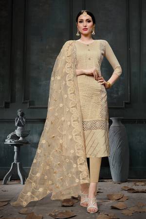Flaunt Your Rich And Elegant Taste Wearing This Designer Suit In Beige Color Paired With Beige Colored Bottom And Dupatta. This Dress Material Is Cotton Based Paired With Orgenza Fabricated Embroidered Dupatta. Buy This Now.