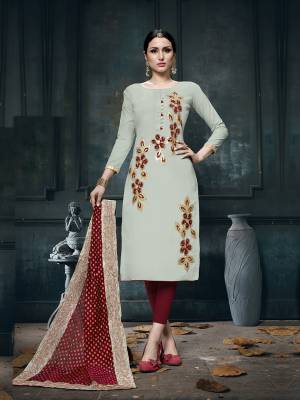 Rich And Elegant Looking Designer Straight Suit Is Here In Light Grey Color Paired With Maroon Colored Bottom And Dupatta. This Dress Material Is Fabricated On Cotton Paired With Jacquard Georgette Fabricated Dupatta. Buy Now.
