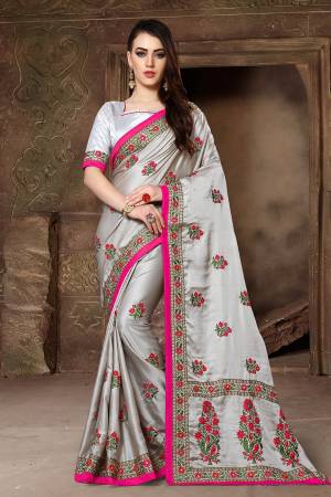Flaunt Your Rich And Elegant Taste Wearing This Designer Saree In Grey Color Paired With Grey Colored Blouse. This Saree And Blouse Are Fabricated On Satin Silk Beautified With Heavy Resham And Jari Work. It Is Suitable For All Occasion Wear. 