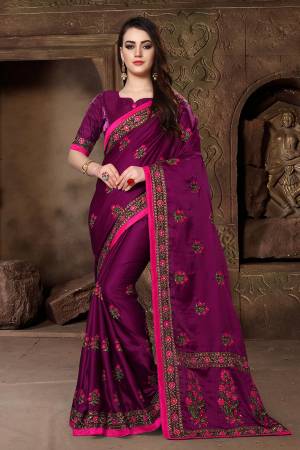 Flaunt Your Rich And Elegant Taste Wearing This Designer Saree In Magenta Pink Color Paired With Magenta Pink Colored Blouse. This Saree And Blouse Are Fabricated On Satin Silk Beautified With Heavy Resham And Jari Work. It Is Suitable For All Occasion Wear. 