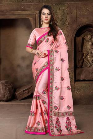 Flaunt Your Rich And Elegant Taste Wearing This Designer Saree In Peach Color Paired With Peach Colored Blouse. This Saree And Blouse Are Fabricated On Satin Silk Beautified With Heavy Resham And Jari Work. It Is Suitable For All Occasion Wear. 