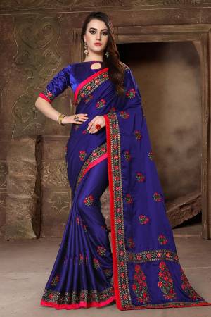 Flaunt Your Rich And Elegant Taste Wearing This Designer Saree In Royal Blue Color Paired With Royal Blue Colored Blouse. This Saree And Blouse Are Fabricated On Satin Silk Beautified With Heavy Resham And Jari Work. It Is Suitable For All Occasion Wear. 