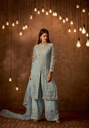 Celebrate This Festive Season With Ease And Comfort Wearing This Designer Straight Suit In Light Blue Color Paired With Light Blue Colored Bottom And Dupatta. Its Top And Dupatta Are Net Fabricated Paired With Satin Raw Silk Bottom. It Is Light In Weight And Easy To Carry all Day Long. 