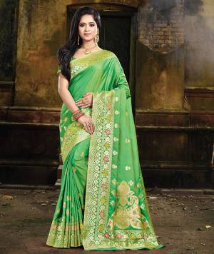 If You Have An Eye For Intricate Designs, Than Grab This Designer Silk Based Saree. This Saree And Blouse Are Fabricated On Art Silk Beautified With Intricate Weave All Over It. It Is Durable And Easy To Care For. 