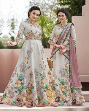 Grab This Designer Lehenga Choli For The Upcoming Festive And Wedding Season. This Lehenga Choli Is Fabricated On Satin Silk Paired With Chiffon Silk Dupatta. It Is Beautified Bold Floral Digital Prints And Thread Embroidery with Stone Work. Its Fabrucs Ensures Superb Comfort All Day Long. Buy Now.