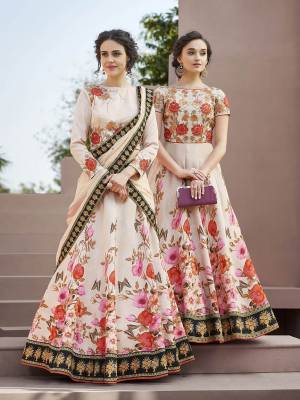 Grab This Designer Lehenga Choli For The Upcoming Festive And Wedding Season. This Lehenga Choli Is Fabricated On Satin Silk Paired With Chiffon Silk Dupatta. It Is Beautified Bold Floral Digital Prints And Thread Embroidery with Stone Work. Its Fabrucs Ensures Superb Comfort All Day Long. Buy Now.