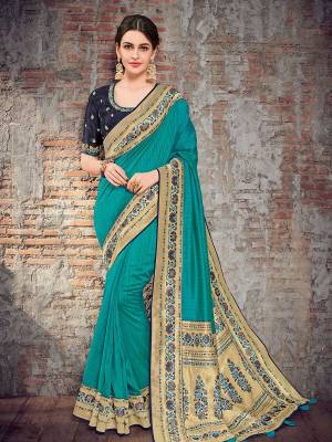 Presenting This Blue color two tone silk fabrics saree. Ideal for party, festive & social gatherings. this gorgeous saree featuring a beautiful mix of designs. Its attractive color and designer heavy design, stone design, silk art design and beautiful design all over work over the attire & contrast hemline adds to the look. Comes along with a contrast unstitched blouse.
