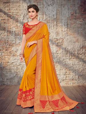 Vibrant and visually appealing, this Musturd yellow color two tone silk fabrics saree. Ideal for party, festive & social gatherings. this gorgeous saree featuring a beautiful mix of designs. Its attractive color and designer heavy design, stone design, silk art design and beautiful design all over work over the attire & contrast hemline adds to the look. Comes along with a contrast unstitched blouse.