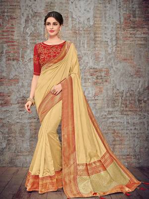 Look gorgeous in this beautiful printed beige color silk fabrics saree. Ideal for party, festive & social gatherings. this gorgeous saree featuring a beautiful mix of designs. Its attractive color and designer heavy design, stone design, silk art design and beautiful design all over work over the attire & contrast hemline adds to the look. Comes along with a contrast unstitched blouse.
