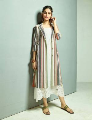 Grab This Designer Patterned Readymade Kurti In White Color Paired With A Very Smart Multi Colored Jacket. This Top And Jacket Are Fabricated On Cotton Beautified With Prints And Thread Work. 