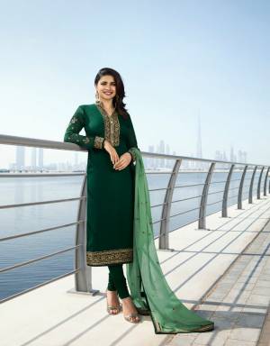 Grab This Beautiful Designer Straight Suit In Dark Green Color Paired With Green Colored Dupatta. Its Top Is Georgette Satin Based Paired With Santoon Bottom And Georgette Fabricated Dupatta. This Designer Suit Is Light In Weight And You can Get This Customised As Per Your Desired Fit And Comfort. 