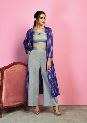 Enhance Your Personality In This Designer Indo Western Dress With Rich Color Pallete. Its Crop Top And Pants Are In Grey Color Paired With A Purple Colored Jacket. Its Top And Bottom Are Fabricated On Cotton Satin Paired With Handloom Cotton Printed Jacket. 