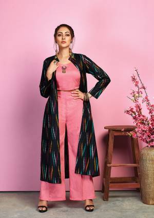 Look Pretty In This Lovely Indo-Western Pair In Pink Colored Crop Top And Pant Paired With Navy Blue Colored Jacket. Its Top And Bottom Are Fabricated On Cotton Satin Paired With Handloom Cotton Fabricated Jacket Beautified With Ikkat Prints. 