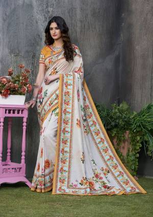 Adorn A Rich And Elegant Look Wearing This Pretty Silk Based Saree. This Saree And Blouse Are Fabricated On Tussar Art Silk Beautified With Prints All Over. This Saree Is Light In Weight And Easy To Carry All Day Long. 