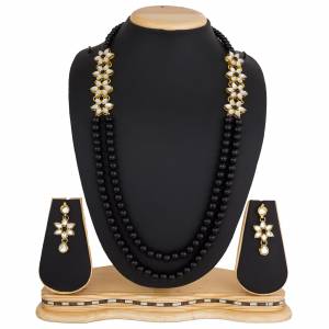Grab This Very Pretty Pearl Necklace Set In Black Color Beautified?With Stone Work. You Can Pair This Up With Same Or Any Contrasting Colored Traditional Attire. Buy Now