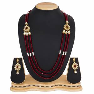 Grab This Very Pretty Pearl Necklace Set In Red Color Beautified?With Stone Work. You Can Pair This Up With Same Or Any Contrasting Colored Traditional Attire. Buy Now