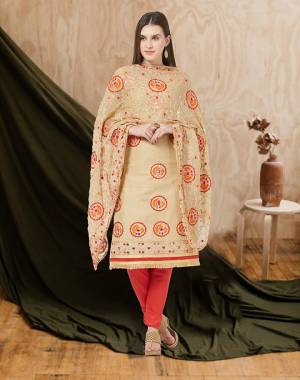 Here Is A Beautiful Embroidered Dress Material In Beige Colored Top and Dupatta Paired With Red Colored Bottom. Its Top And Bottom Are Cotton Based Paired With Chiffon Fabricated Dupatta. Buy Now.