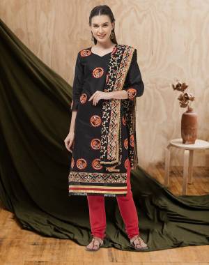 Here Is A Beautiful Embroidered Dress Material In Black Colored Top and Dupatta Paired With Red Colored Bottom. Its Top And Bottom Are Cotton Based Paired With Chiffon Fabricated Dupatta. Buy Now.