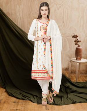 For an All Over Look, Grab This Designer Dress Material In White Color. This Dress Material Is Cotton Based Paired With Chiffon Fabricated Dupatta. Its Pretty Multi Colored Thread Work Is Giving This Suit An Attractive Look. 