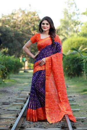 This Festive Season Be The Most Unique Of All Wearing This Handicraft Bandhani Saree. This pretty Saree And Blouse Are Fabricated On Tafeta Art Silk Which Also Gives A Rich Look To Your Personality. 