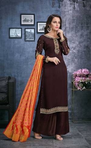 Enhance Your Personality Wearing This Designer Straight Suit In Brown Color Paired With Contrasting Orange Colored Dupatta. Its Top Is Fabricated On Satin Georgette Paired With Santoon Bottom And Jacquard Silk Fabricated Weaved Dupatta. 