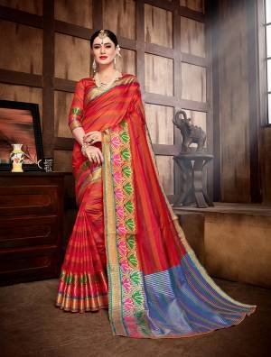 Celebrate This Festive Season With Ease And Comfort Wearing This Saree In Red Color Paired With Red Colored Blouse. This Saree And Blouse Are Fabricated On Banarasi Art Silk Beautified With Weave All Over. 
