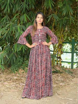 Get This Very Pretty Readymade Designer Kurti For Your Semi-Casuals. This Pretty Kurti Is Fabricated On Rayon Beautified With Prints All Over. It Is Available In All Regular Sizes. Buy Now.