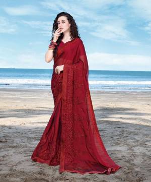 Here Is Royal Looking Designer Saree In Maroon Color Paired With Maroon Colored Blouse. This Saree Is Fabricated On Georgette Satin Paired With Art Silk Fabricated Blouse. Buy Now.