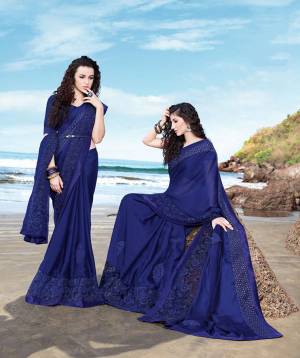 Bright And Visually Appealing Color Is Here With This Designer Saree In Royal Blue Color Paired With Royal Blue Colored Blouse. This Saree Georgette Based Saree Is Light Weight And Easy To Carry All Day Long. 