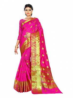 Beat This Heat This Summer Wearing This Pretty Attractive Rani Pink Colored Saree. This Saree And Blouse Are Fabricated On Cotton Silk Beautified With Weave Butti All Over. Also It Is Light In Weight And Easy To Carry All Day Long. 