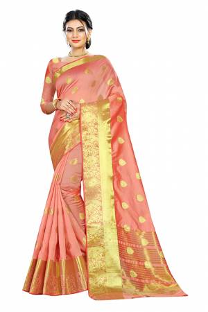 Beat This Heat This Summer Wearing This Pretty Attractive Peach Colored Saree. This Saree And Blouse Are Fabricated On Cotton Silk Beautified With Weave Butti All Over. Also It Is Light In Weight And Easy To Carry All Day Long. 
