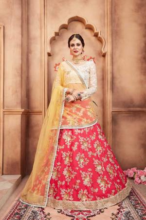 Colors Add Beauty To Any Garment And Ofcourse To Your Look. Grab This Designer Lehenga Choli In White Colored Blouse Paired With Red Colored Lehenga And Contrasting Yellow Colored Dupatta. Its Blouse And Dupatta are Net Fabricated Paired With Art Silk Fabricated Lehenga. 