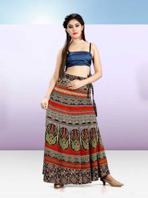 Grab This Beautiful Wrap Around Skirt In Multi Color For Your Casuals Or Semi-Casuals. This Skirt Is Fabricated On Rayon Beautified With Prints All Over.