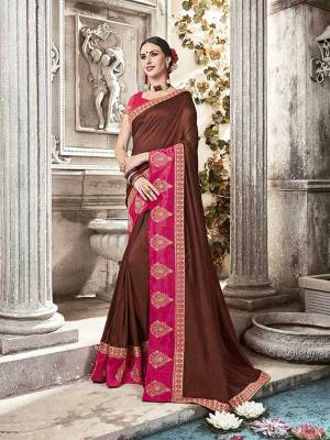 Grab This Designer Brown Colored Saree Paired With Contrasting Rani Pink Colored Blouse. This Saree And Blouse Are Silk Based Beautified With Attractive Embroidery. Buy Now.