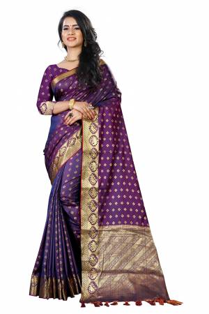 Add This Beautiful Silk Based Saree To Your Wardrobe In Purple Color Paired With Purple Colored Blouse. It Is Beautified With Attractive Butti Weave Over The Saree And Blouse. Buy Now.