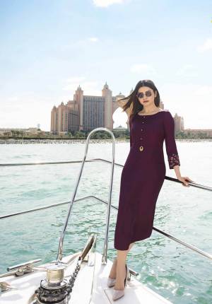 A Must Have Shade In Every Womens Wardrobe Is Here With This Designer Readymade Straight Cut Kurti In Wine Color. This Pretty Kurti Is Fabricated Satin Silk Beautified With Embroidered Sleeves And Buttons. Buy Now.