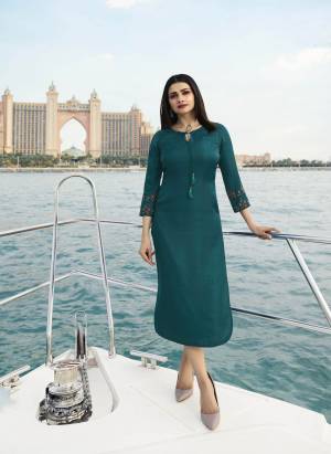 New Shade Is Here To Add Into Your Wardrobe With This Designer Readymade Straight Cut Kurti In Teal Blue Color Fabricated On Satin Silk. Its Fabric Ensures Superb Comfort All Day Long. Buy Now.