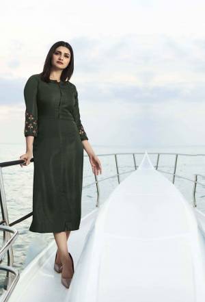Grab This Pretty Readymade Designer Kurti In Forest Green Color Fabricated On Satin Silk. This Straight Kurti Is Beautified With Embroidery With yoke And Sleeves. 
