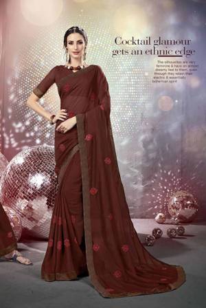 Grab This Beautiful Designer For The Upcoming Festive Season. This Saree Is Fabricated On Chiffon Paired With Art Silk Fabricated Blouse. It Is Beautified With Pretty Tone To Tone Embroidery. Buy This Designer Saree Now.