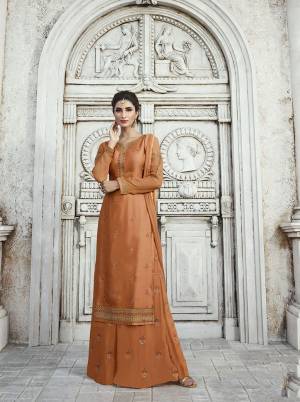 New Shade Is Here To Add Into Your Wardrobe With This Designer Straight Plazzo Suit In Light Brown Color. Its Top IS Fabricated On Satin Georgette Paired With Georgette Bottom And Chiffon Fabricated Dupatta, All Its Fabrics Are Light Weight And Easy To Carry All Day Long. 