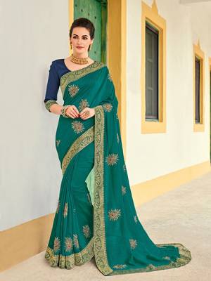 Get this amazing saree and look pretty like never before. wearing this Sea green color silk pattern saree. Ideal for party, festive & social gatherings. this gorgeous saree featuring a beautiful mix of designs. Its attractive color and designer heavy embroidered design, Flower embroidered butta design, stone design, beautiful floral design work over the attire & contrast hemline adds to the look. Comes along with a contrast unstitched blouse.