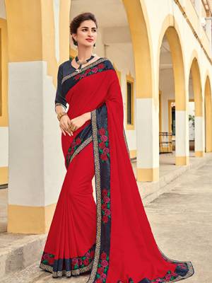Look your ethnic best by wearing this red color silk fabrics saree. Ideal for party, festive & social gatherings. this gorgeous saree featuring a beautiful mix of designs. Its attractive color and designer heavy embroidered design, Flower embroidered butta design, stone design, beautiful floral design work over the attire & contrast hemline adds to the look. Comes along with a contrast unstitched blouse.