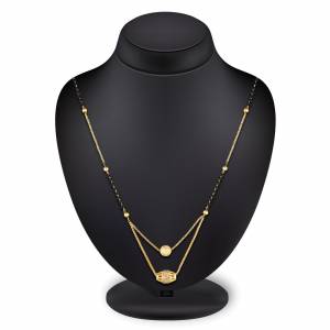 Grab This Pretty Simple Mangalsutra For Your Daily Wear In Golden?Color Beautified With Diamonds. This Mangalsutra Can Be Paired With Any Attire. Buy Now