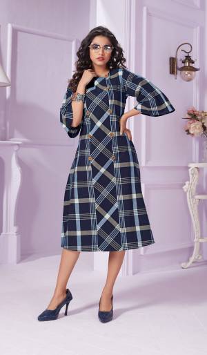 Grab This Beautiful Readymade Kurti In Blue Color Fabricated On Cotton Beautified With Bold Checks Prints All Over It. This Kurti Is Light Weight And Easy To Carry All Day Long. 