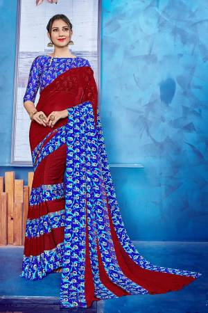 Add Some Casulas With This Beautiful Printed Saree Fabricated On Georgette Paireed With Satin Fabricated Blouse. This Saree Is Beautified With Printed Satin Patta Giving It An Attractive Look. 