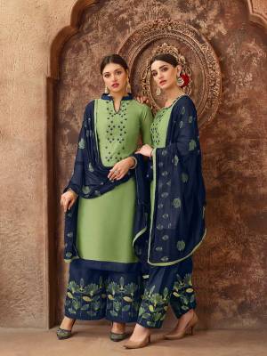 Beat The Heat This Summer With These Cotton Based Dress Material. Grab This Dress Material In Light Green Colored Top Paired With Contrasting Navy Blue Colored Bottom And Dupatta. Its Top And Bottom are Cotton Based Paired With Chiffon Fabricated Dupatta. Buy Now.