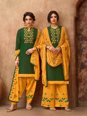 Simple And elegant Looking Straight Suit Is Here In Dark Green Colored Top Paired With Musturd Yellow Colored Bottom And Dupatta. This Dress Material Is Cotton Based Paired With Chiffon Fabricated Dupatta. Get This Stitched As A Plazzo Or Salwar As Per Your Desired Comfort. 