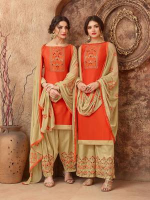 Add This Pretty Dress Material In Orange And Beige Color For Your Casual Wear, This Dress Material Is Cotton based Paired With Chiffon Fabricated Dupatta. Get This Stitched As Per Your Desired Fit And Comfort. Buy Now.
